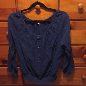 A blue button long sleeved shirt
